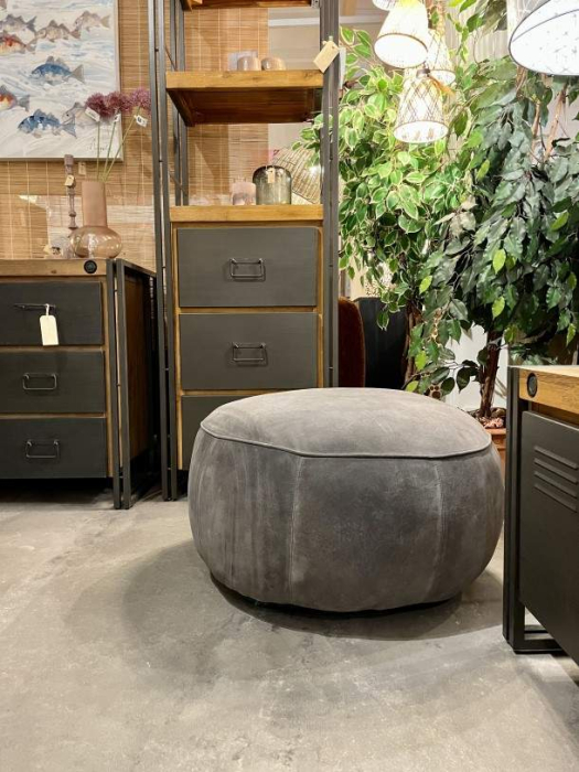 Lederen poef rond 