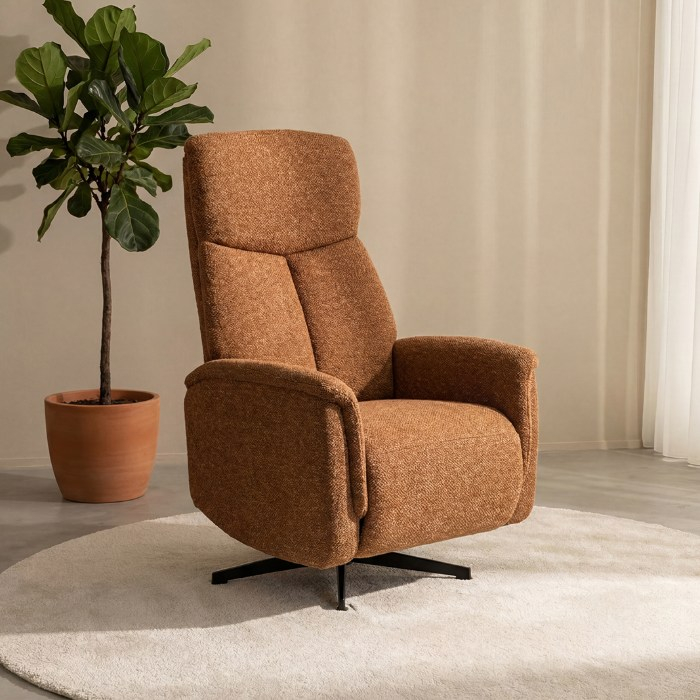 Relaxfauteuil Hidde in cognac bouclé in een woonkamer