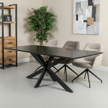 Eettafel zwart van hout met spinpoot.