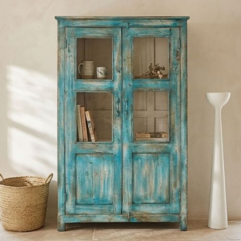 Groene vitrine kast uit India.