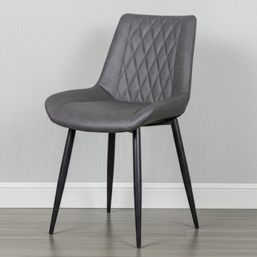 Grijze eetkamerstoel.