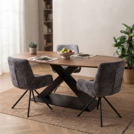 Eettafel industrieel. Donker hout met groot onderstel van metaal.