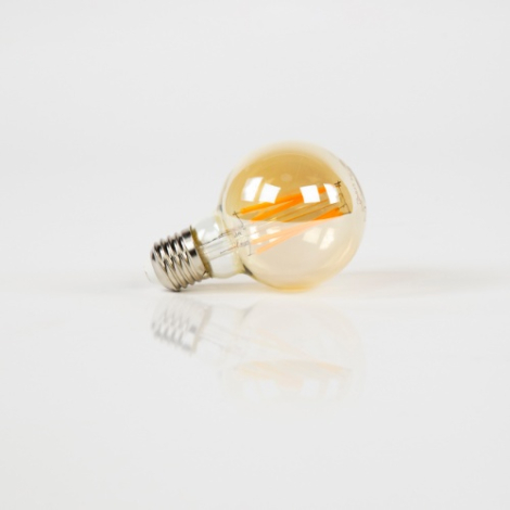 LED filamentlamp bol 7 cm E27 amber dimbaar - vooraanzicht