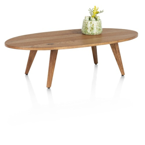 Ovale salontafel Everest 120 x 60 cm in mangohoutfineer op vier schuine poten, hoekaanzicht met vaas en gele bloemen