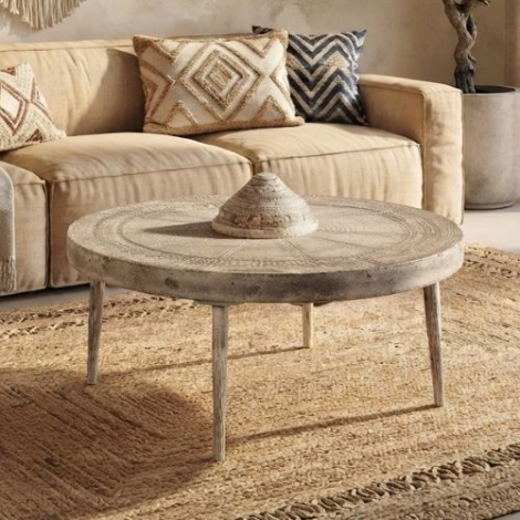 Ronde salontafel uit India. Gemaakt van een wiel
