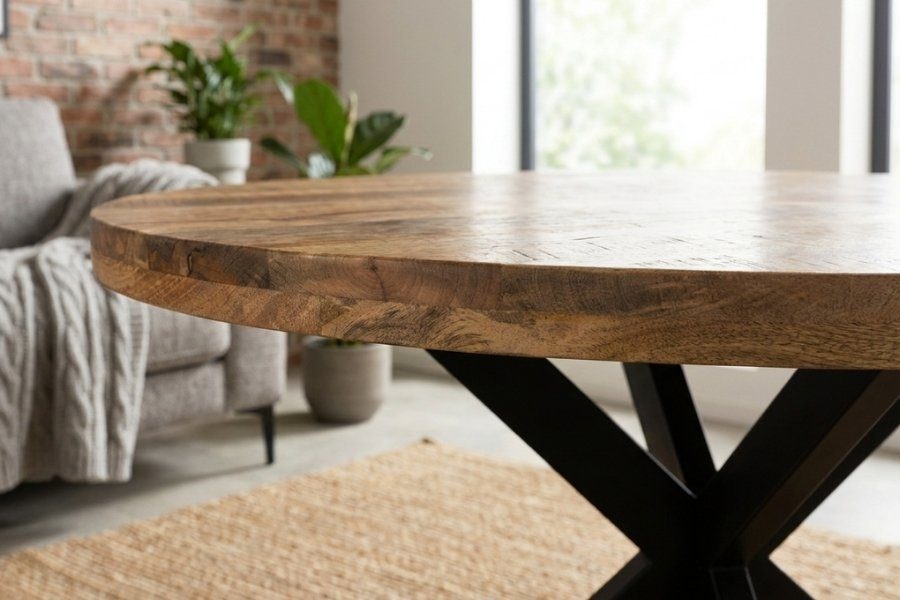 Dik rond mangohouten tafelblad met zichtbare houtnerf